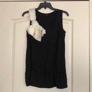 Black tank top with white accent.